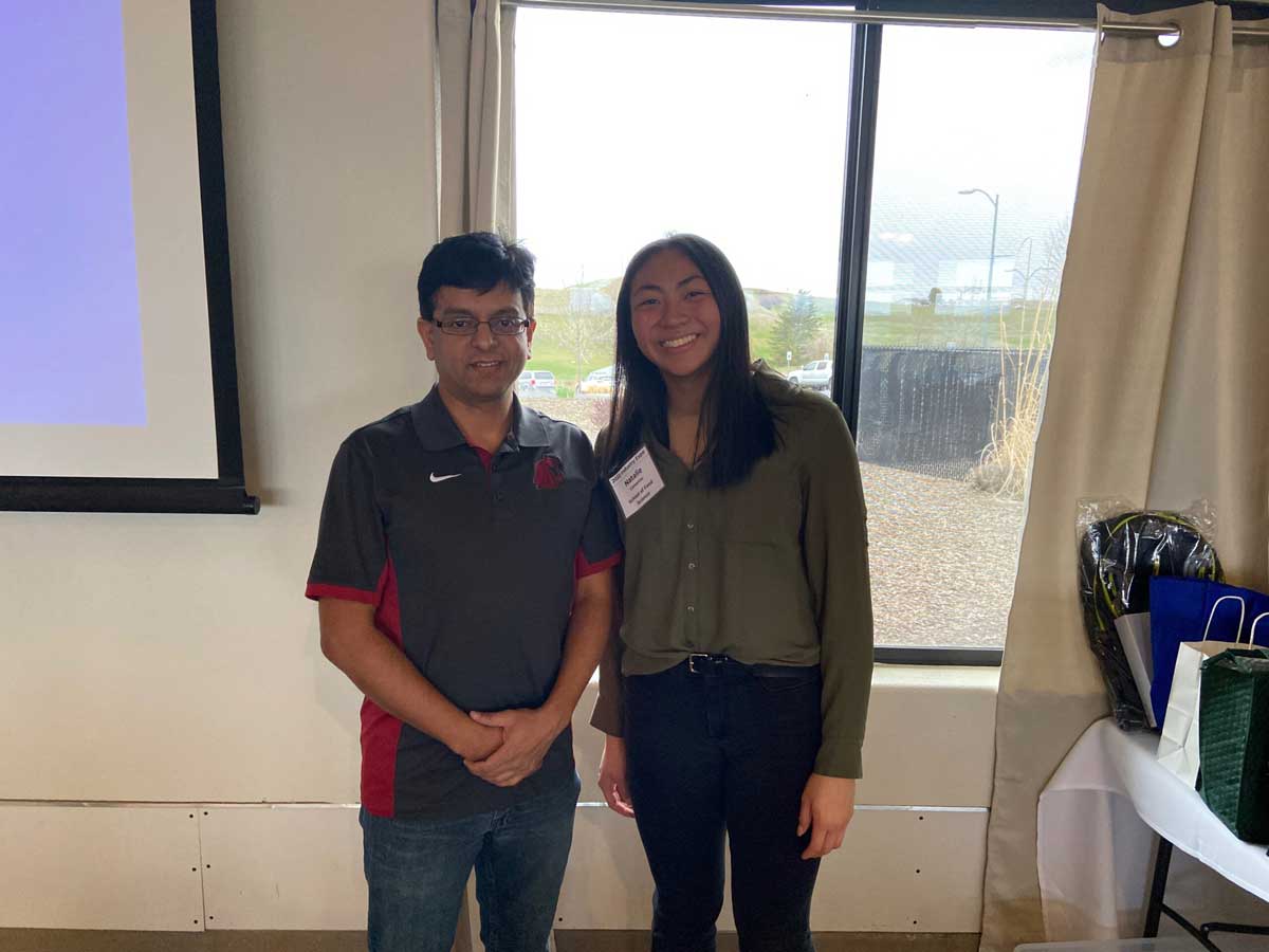 Natalie Camerino standing with another student.