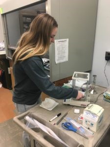 Gena Franco working in lab.