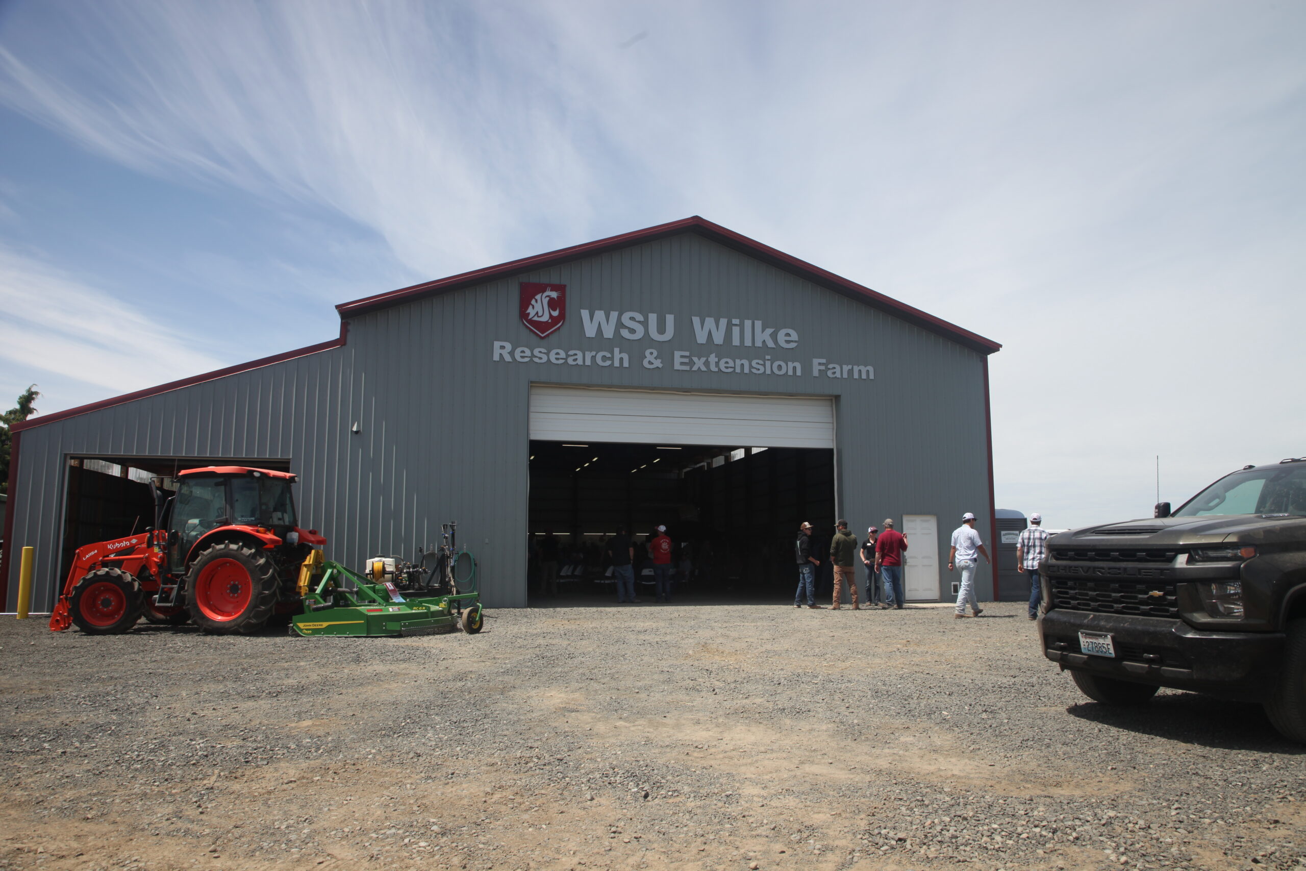 The front of the WSU Wilke Research & Extension Farm with tractors and farm equipment