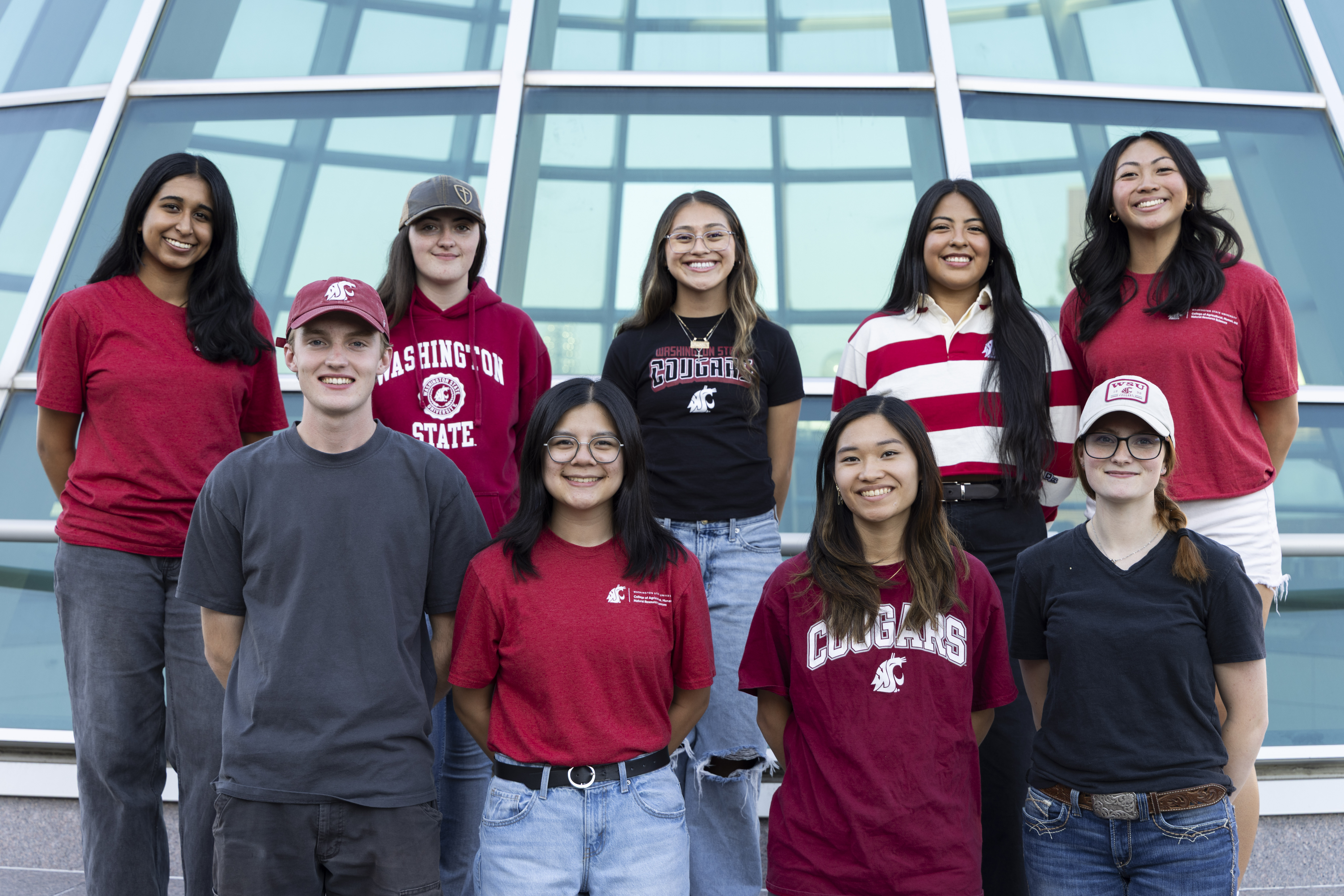 Group of 9 students standing together.