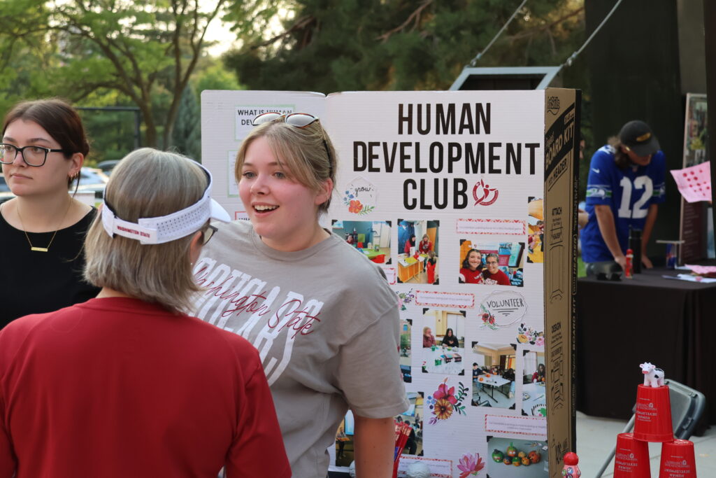 Human Development Club's booth at Fall Festival is welcoming students