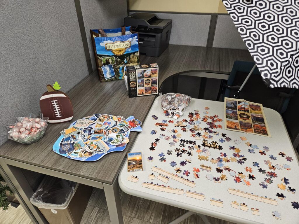 A Yellowstone bag, puzzle, and stickers