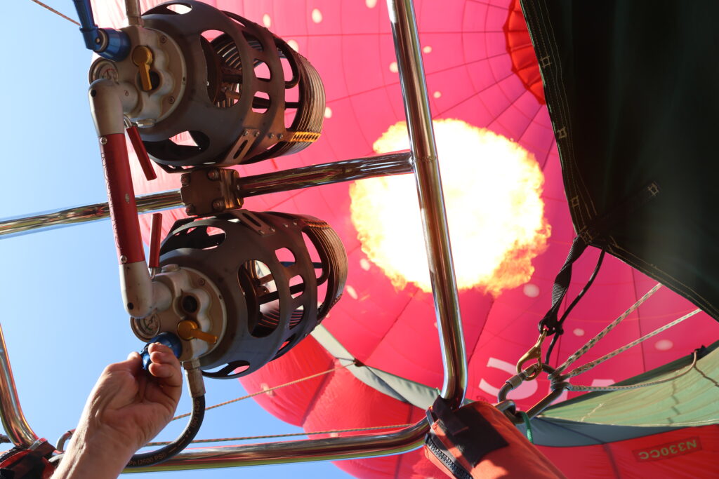 A close-up of the fire going up through the structure of the Cosmic Crisp balloon