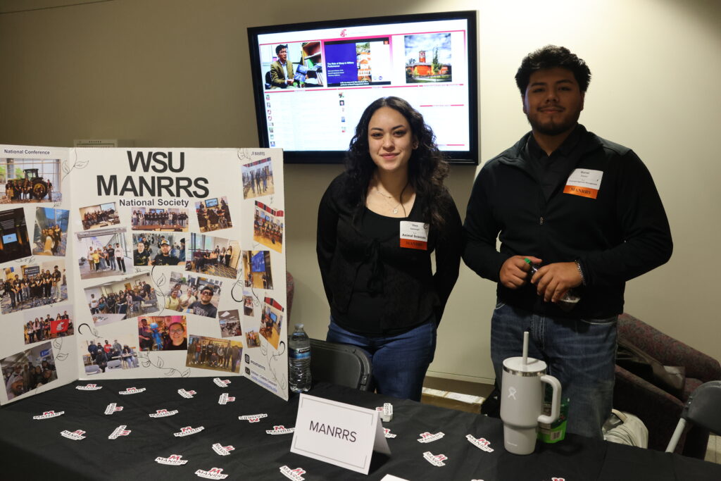 WSU MANRRS representatives present at their booth at the CAHNRS Career Fair and Networking Night.
