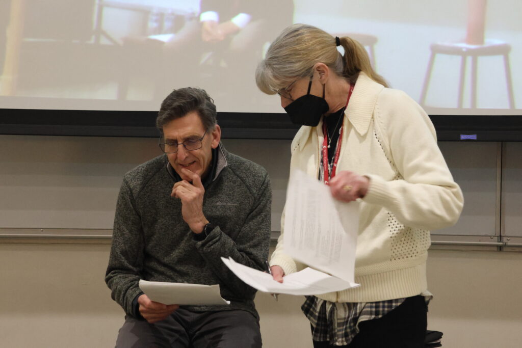 Associate Dean Hulbert and Associate Dean McCracken go over notes for some of the questions before the CAHNRS Town Hall begins.