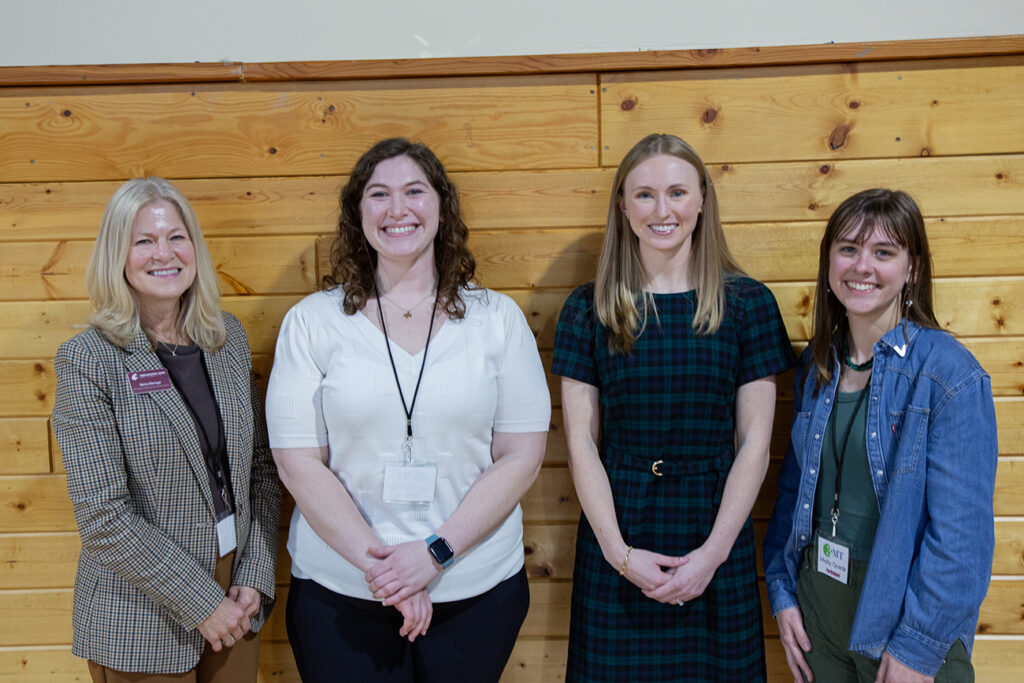 The winners of 3MT pose with Associate Dean Deringer