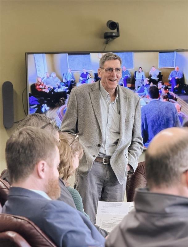 Scot Hulbert speaks at a conference.