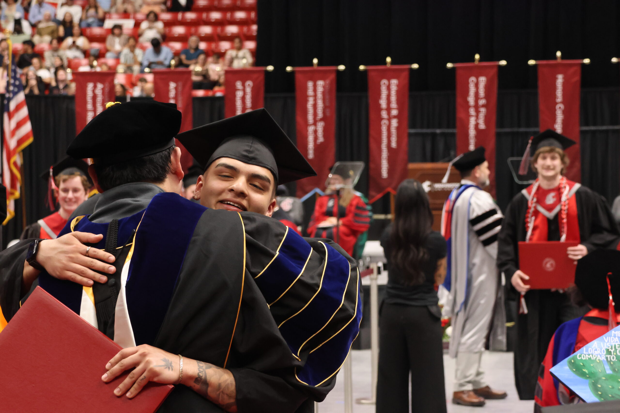 A warm hug at graduation.