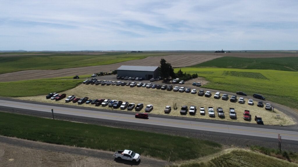 An aerial view of vehicles parked at the Wilke Farm.