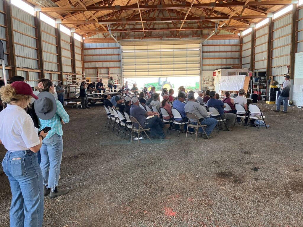 Wilke field day participants listen as Aaron Esser presents.