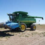 stripper header for harvesting wheat