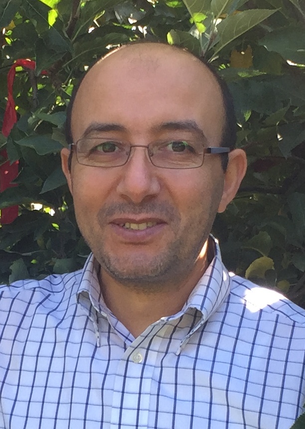 head shot of Achour Amiri
