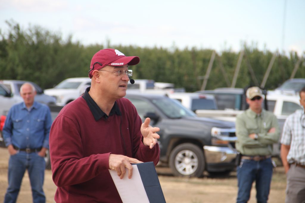Musacchi amid a group of growers.