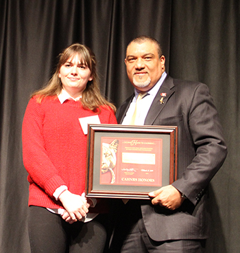 Taylor, left, on stage with Dean Wright, right.