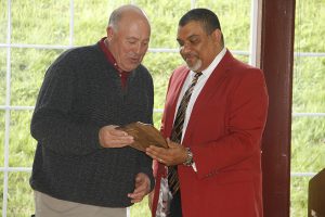 Durfey accepts his award from Wright.