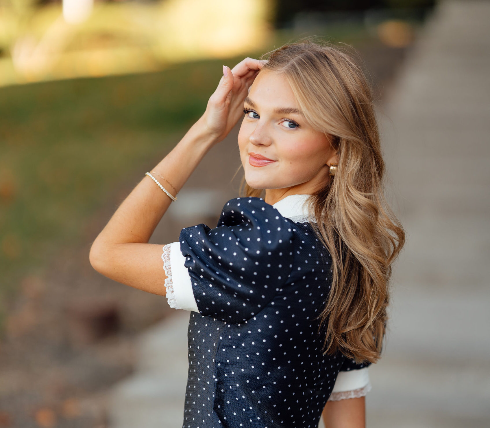 AMDT grad Ava Rambo carries college banner at fall commencement ...