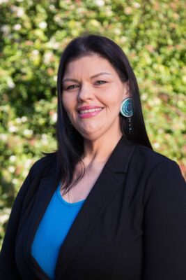 Formal portrait photo of Tosha Big Eagle.