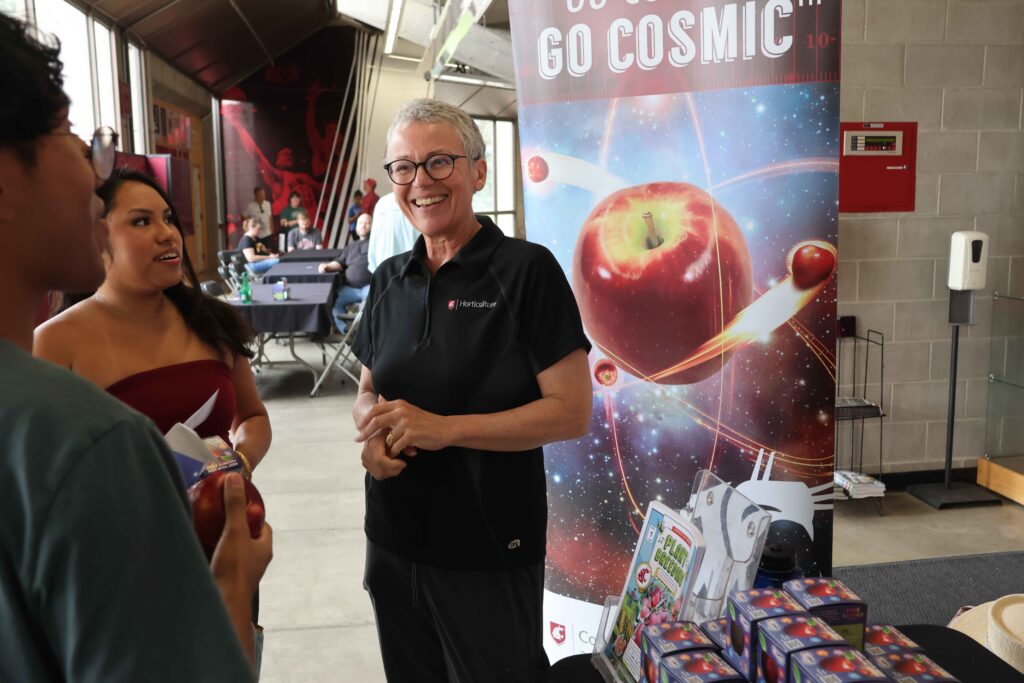 Kate Evans interacts with move-in day participants