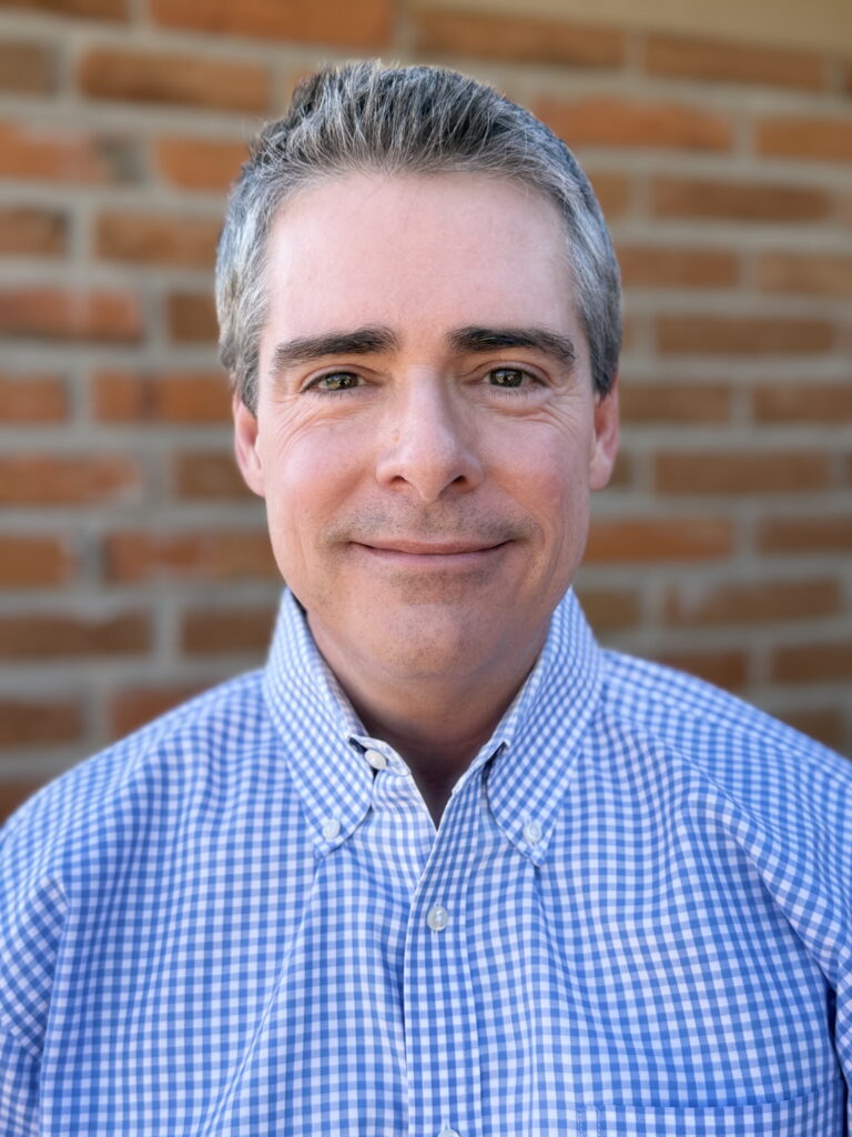 Portrait photo of Kory Floyd