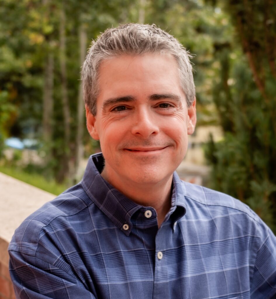 Professional headshot of Kory Floyd.
