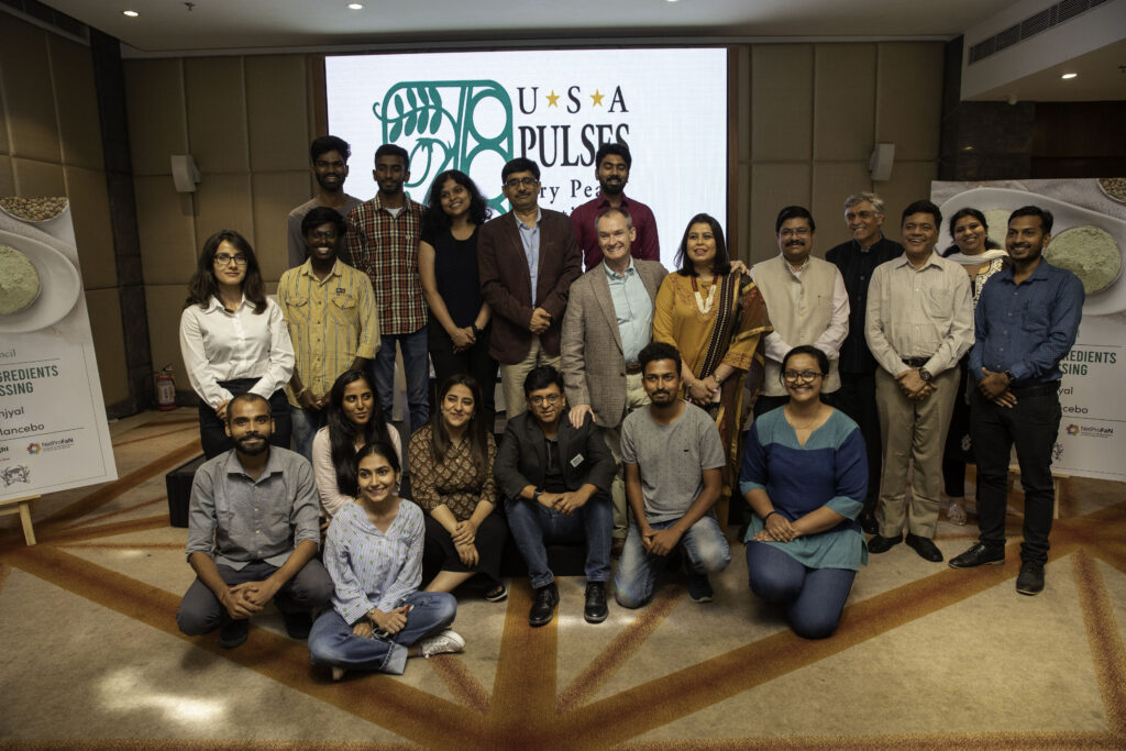 A group of people smiling toward the camera.