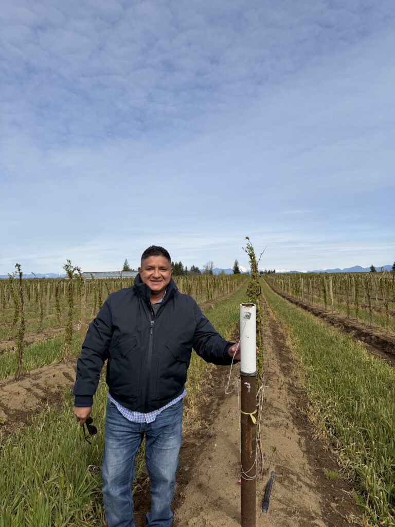 Germán Sandoya-Miranda visits a Washington raspberry farm. Photo courtesy Germán Sandoya-Miranda.