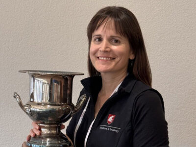 Michelle Moyer holds the Walter Clore Award trophy.
