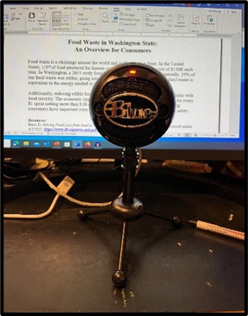 Mic set up in front of Food Safety in a Minute script.