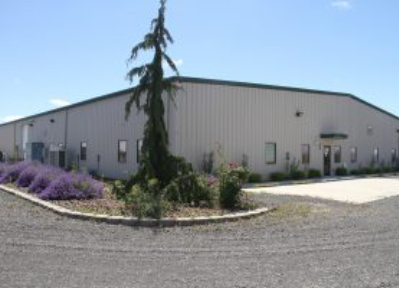 The exterior of a one story building.