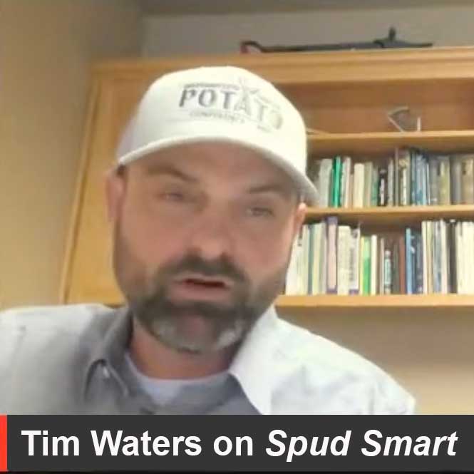 Man in baseball cap speaks on a video conference