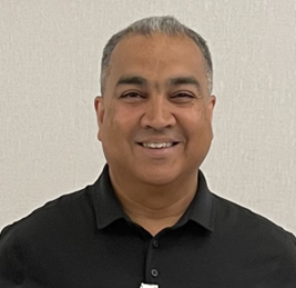 Baljit Ghotra headshot.  Baljit is wearing a black shirt.