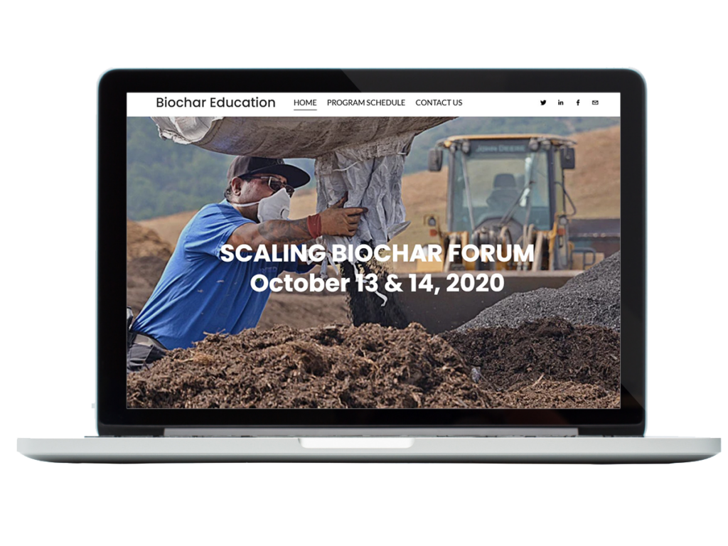 Laptop with "Scaling Biochar Forum" text on a website.