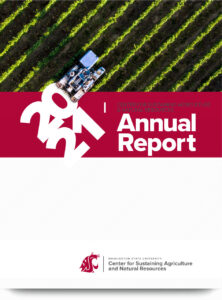 Report cover with a tractor in a field