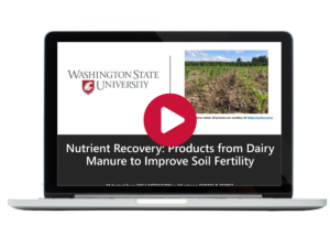 Laptop showing illegible title card of online video.