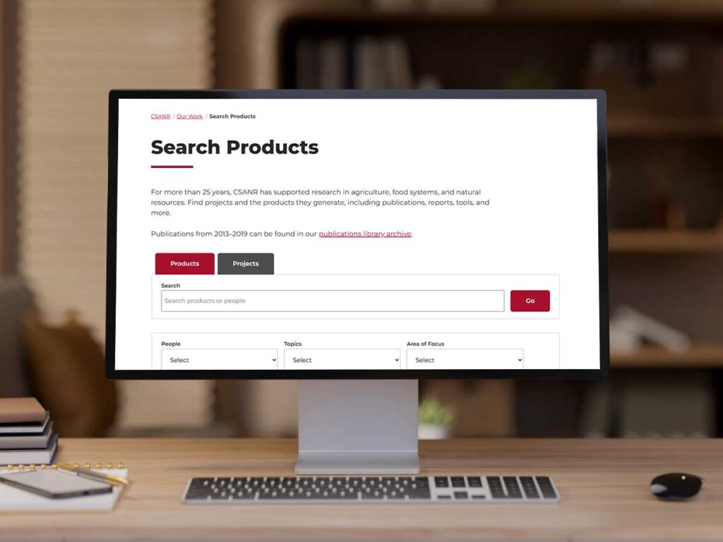 Computer monitor with product search database screenshot superimposed.