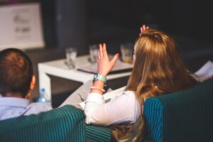 woman at a small conference
