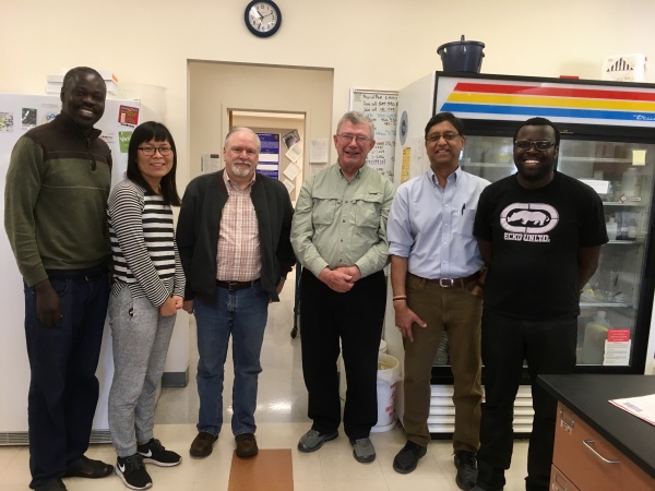 group picture of six smiling individuals