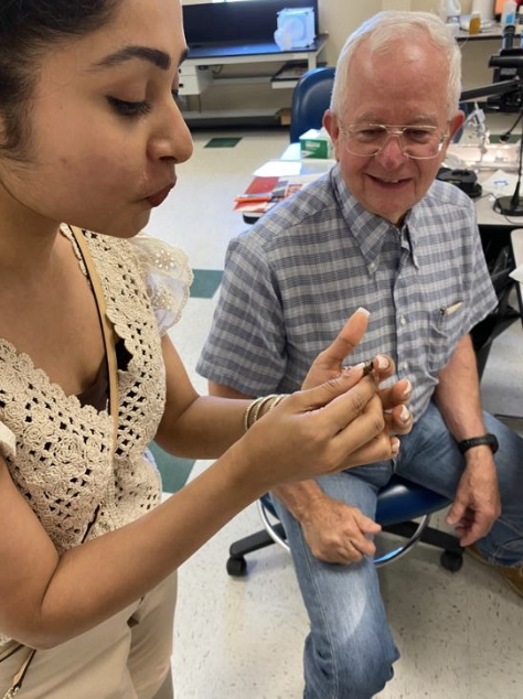Pooja holding drone bee