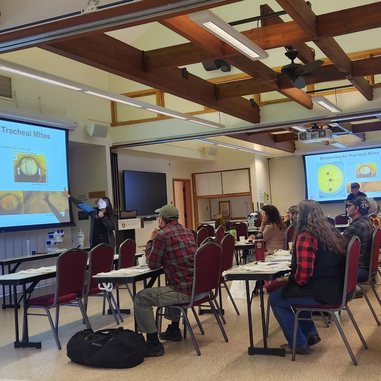 Bri Price talking to group at diagnostic microscopy workshop