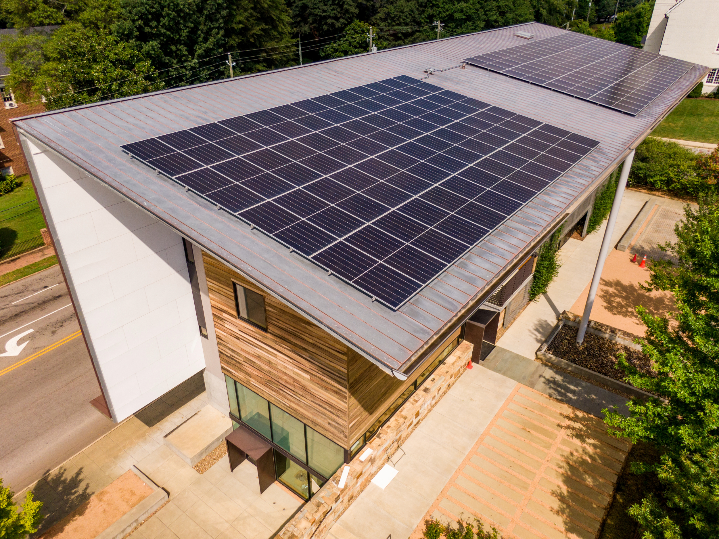 A leed-certified modern home with solar panels on the roof. 