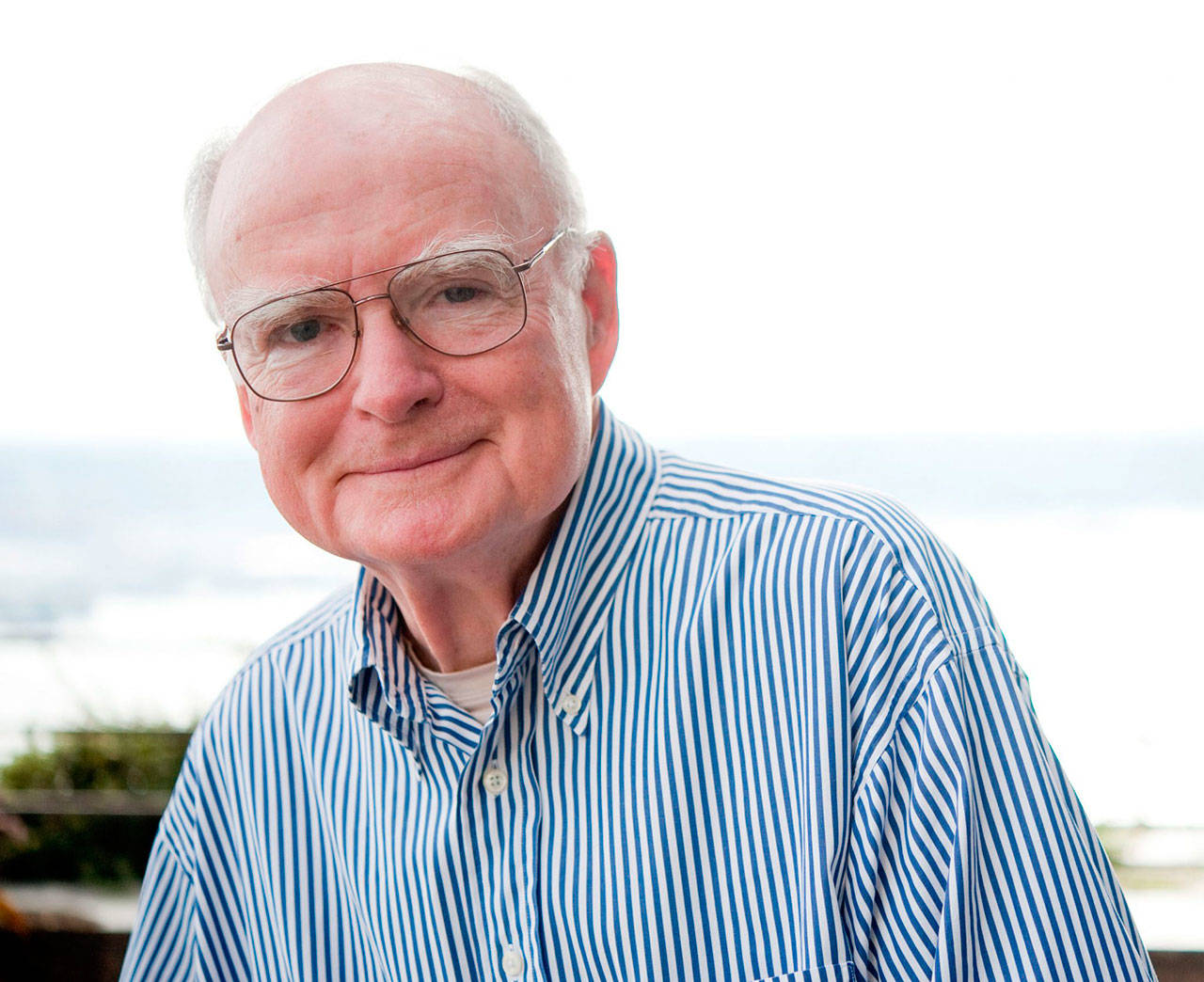 Bill Ruckelshaus smiling.