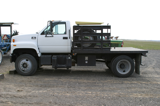 A picture of a two ton pickup with a flat bed.