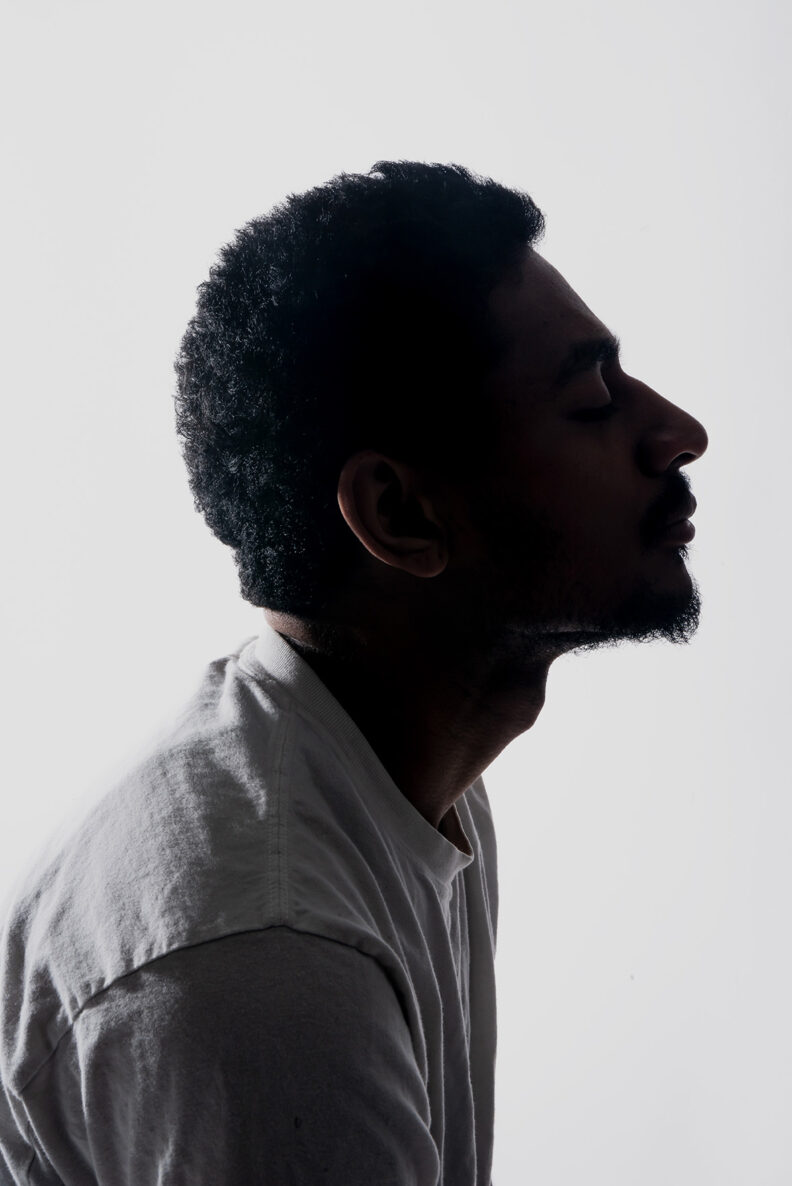 Photograph portrait from side. 