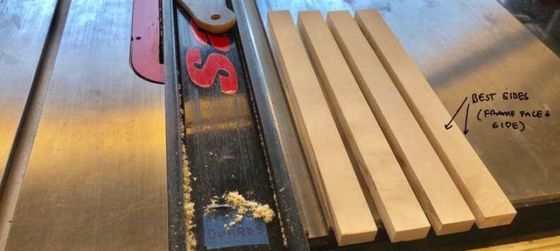 Photo showing four boards with front face of the material is on the right, and the frame side is up. Image links to larger version.