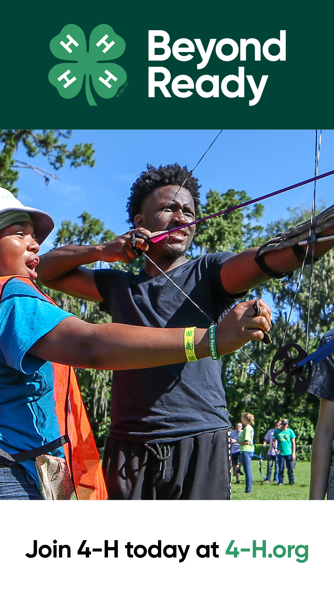 Image of 2 youth doing archery