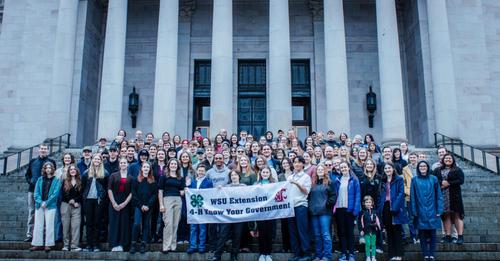 Youth participated in Olympia for the 2024 Know Your Government program are pictured at the capitol building in Washington State.