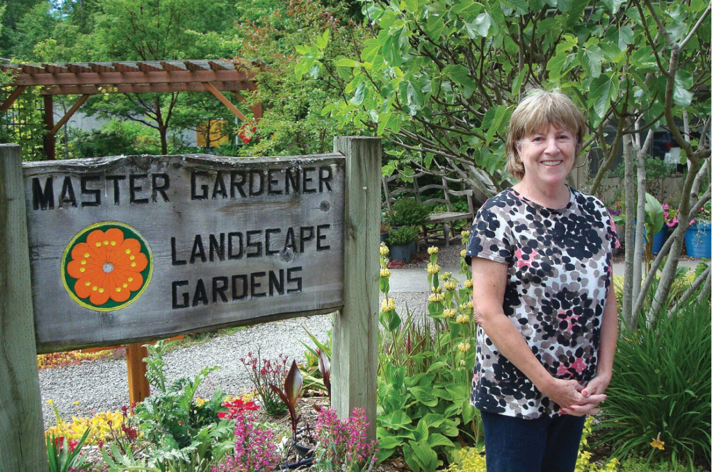 Master Gardener Michele Duncan works in one of the program's demonstration gardens.