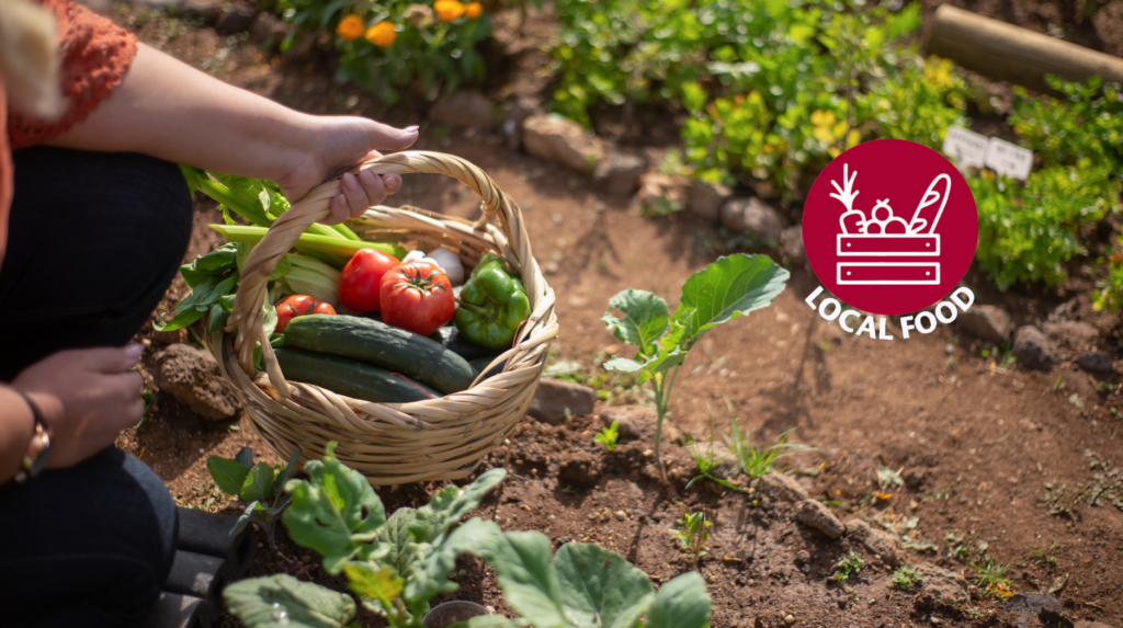 Woman holding basket of fresh produce.