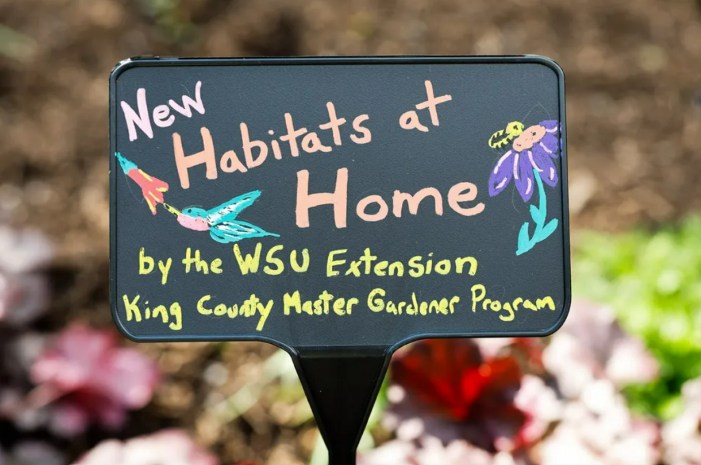 Signage in the Habitats for Home display at the Bellevue Botanical Garden in Bellevue on April 11. The garden focuses on creating a habitat for pollinators and wildlife. All the things in the garden are easily available to gardeners.