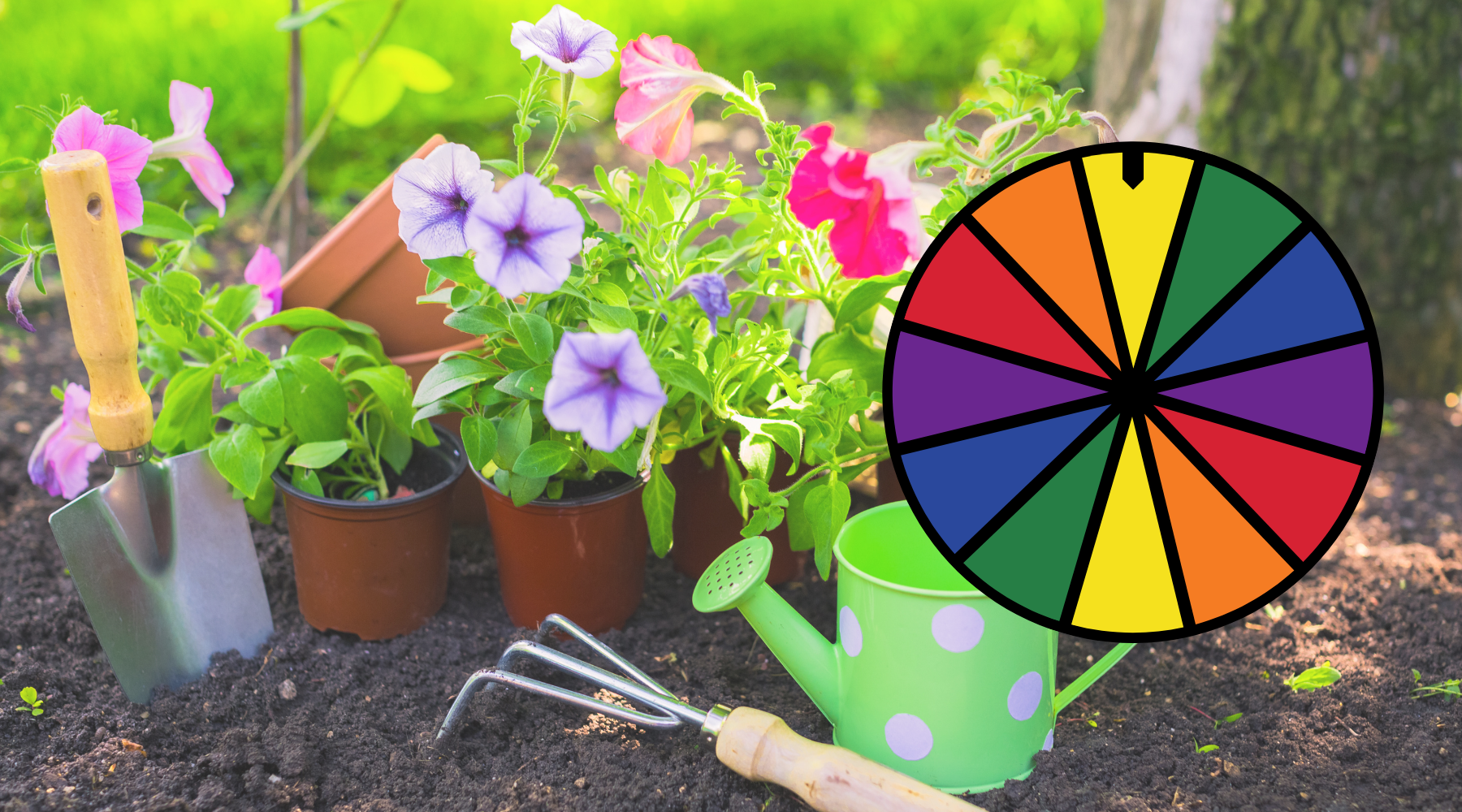 Spinning wheel on background of gardening tools and flowers.